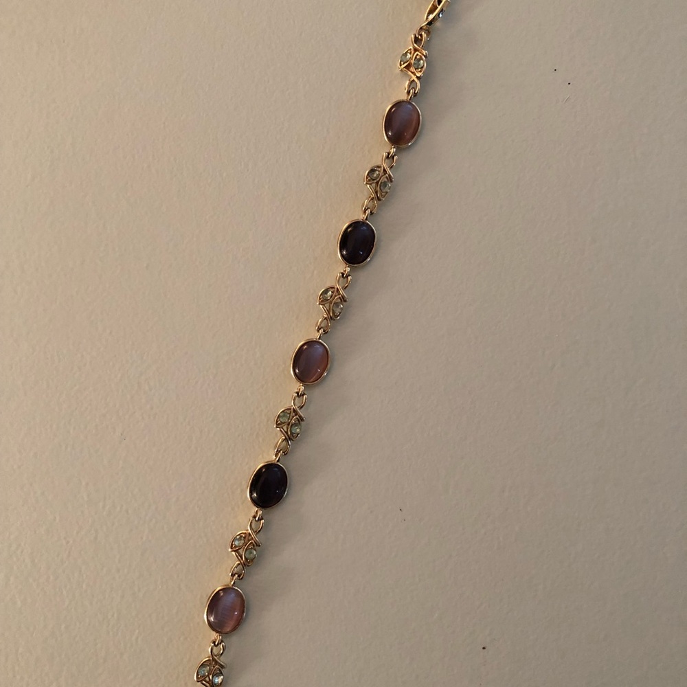 Gold Colored Bracelet with Purple & Green Stones